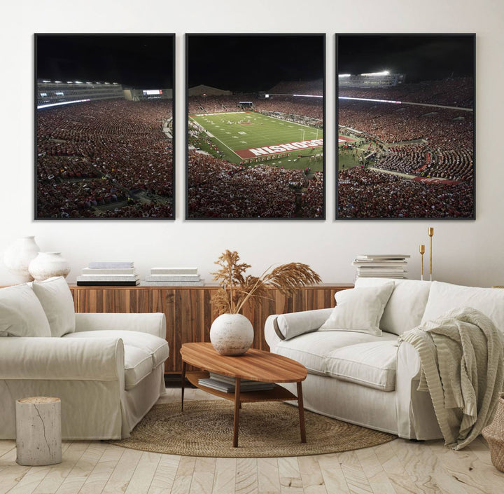 A painting of a stadium packed for a Wisconsin Badgers game, with WISCONSIN clearly visible in the end zone at Camp Randall Stadium.