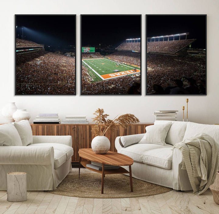 A football game at a packed stadium is captured on the University of Texas Longhorns Stadium Canvas Print.