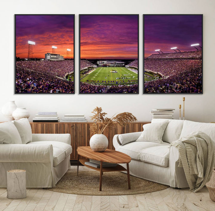 A sunset over Dowdy-Ficklen Stadium, Greenville, captured on museum quality canvas with vibrant purple and orange skies.