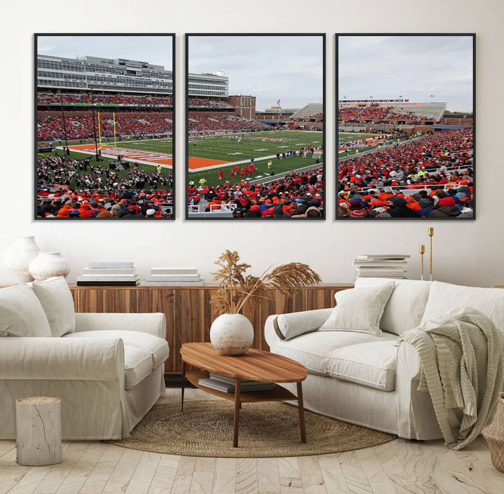 A University of Illinois Fighting Illini wall art canvas hangs on the wall, depicting a packed stadium.