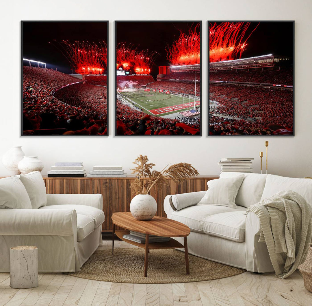 A vibrant red canvas art of a packed Ohio State Buckeyes stadium at night with fireworks.