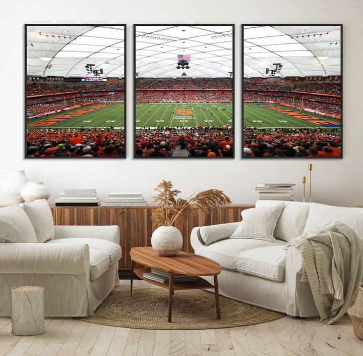 Fans fill the Syracuse JMA Wireless Dome, highlighted in orange and blue under a vaulted roof on this premium canvas print of the scene.