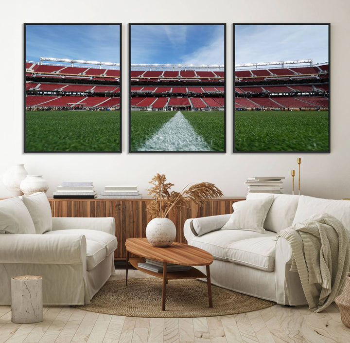 A canvas print of the University of Tulsa Golden Hurricane showcases H.A. Chapman Stadiums football field and red seats against a backdrop of a blue sky.