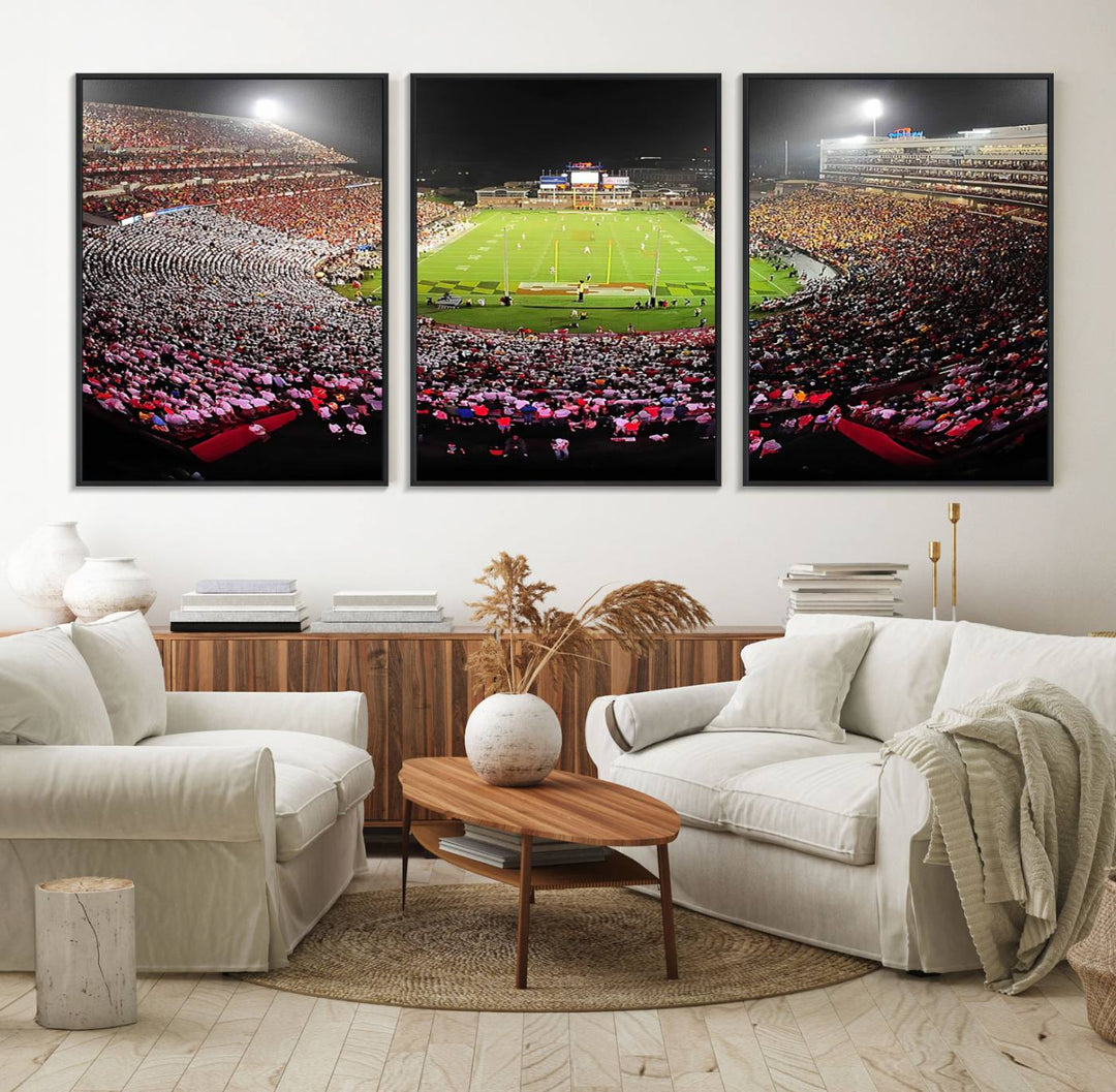 The Maryland Terrapins Football Wall Art Canvas showcases a packed SECU Stadium at night with a bright field and cheering fans.