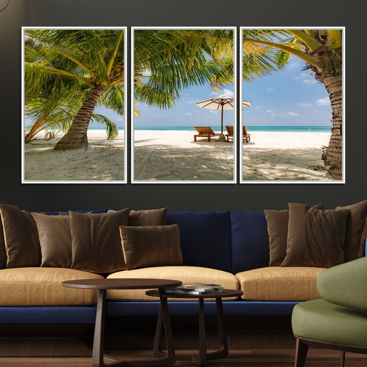 The canvas art print titled Lounge Chairs Palm Trees on Tropical Beach offers free shipping.