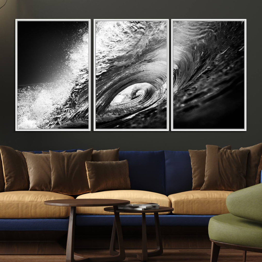 The Black Ocean Wave at Sunset Canvas Art hangs on a grey wooden wall.