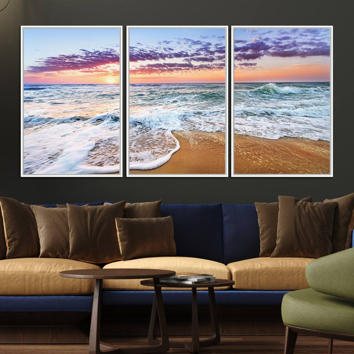 The Vivid Sunset Ocean Waves Triptych hangs on a wooden wall.