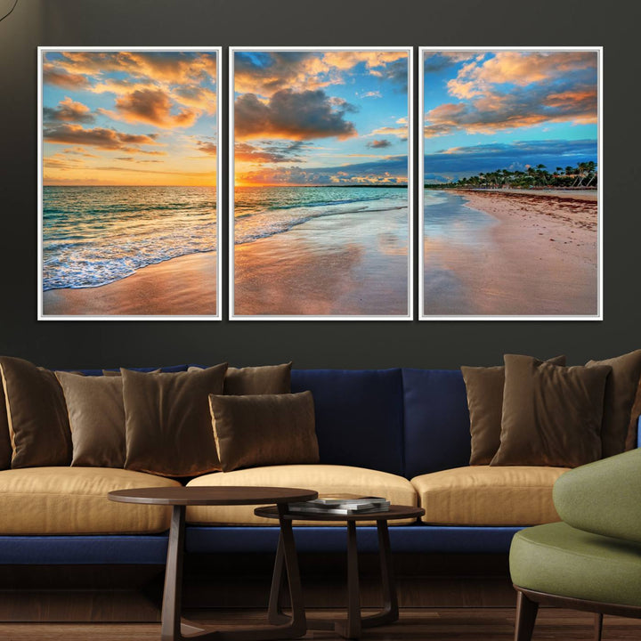 A wall displays Sunset Ocean Waves on Tropical Beach 3-panel canvas art.