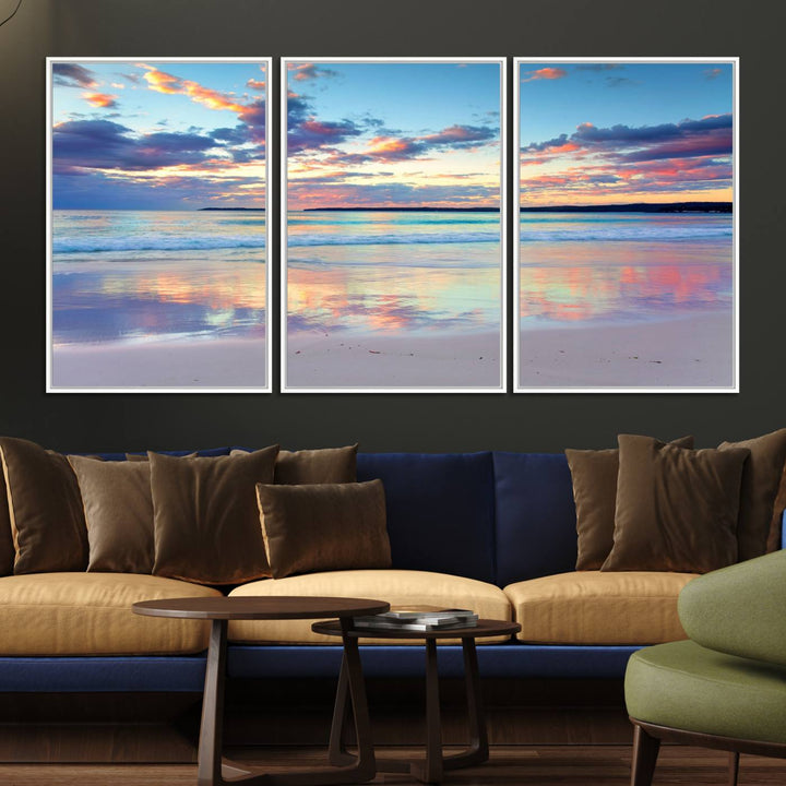 The Tranquil Pastel Sunset Beach Triptych Canvas Art hangs, showcasing its serene beauty.