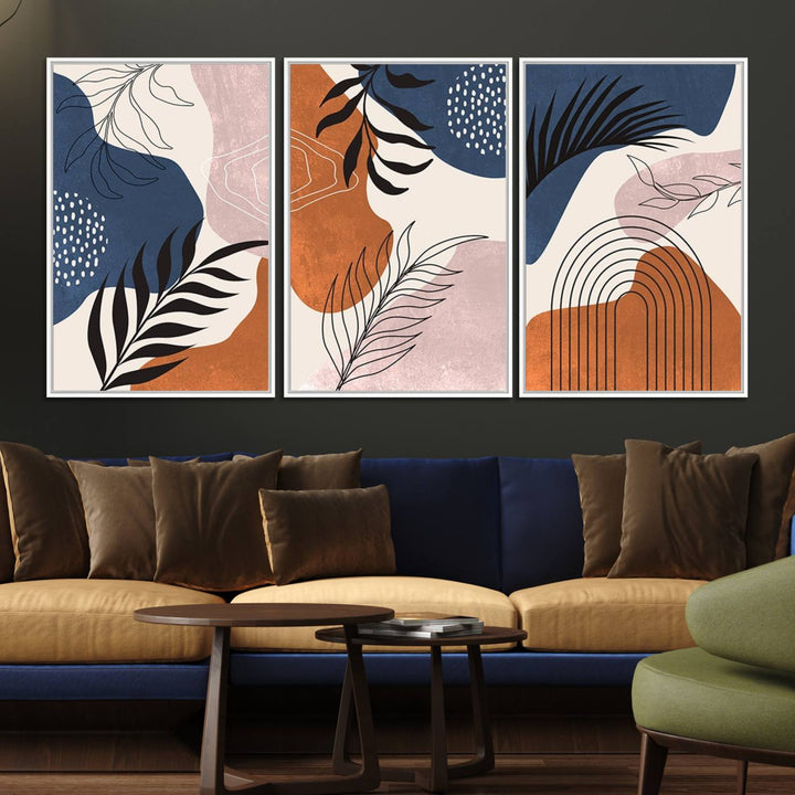 Boho Wall Art Canvas Print Set showcases mid-century geometric and leaf motifs in blue, ochre, and pink.