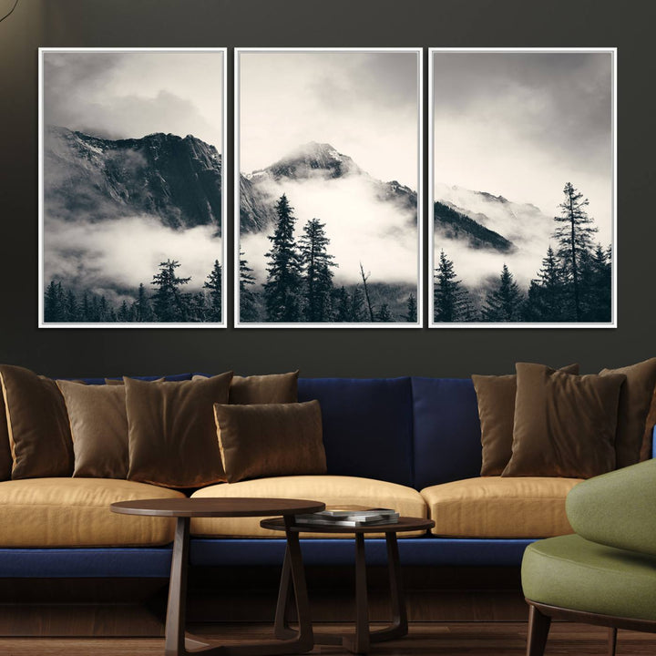 A large foggy mountain forest canvas print hangs prominently in the room.