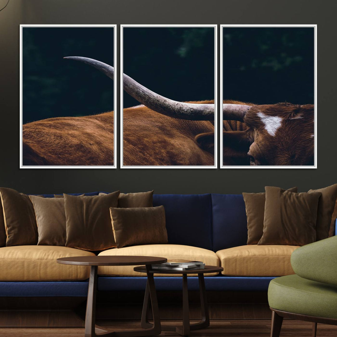 The kitchen dining area features a Texas Longhorn Bull wall art.