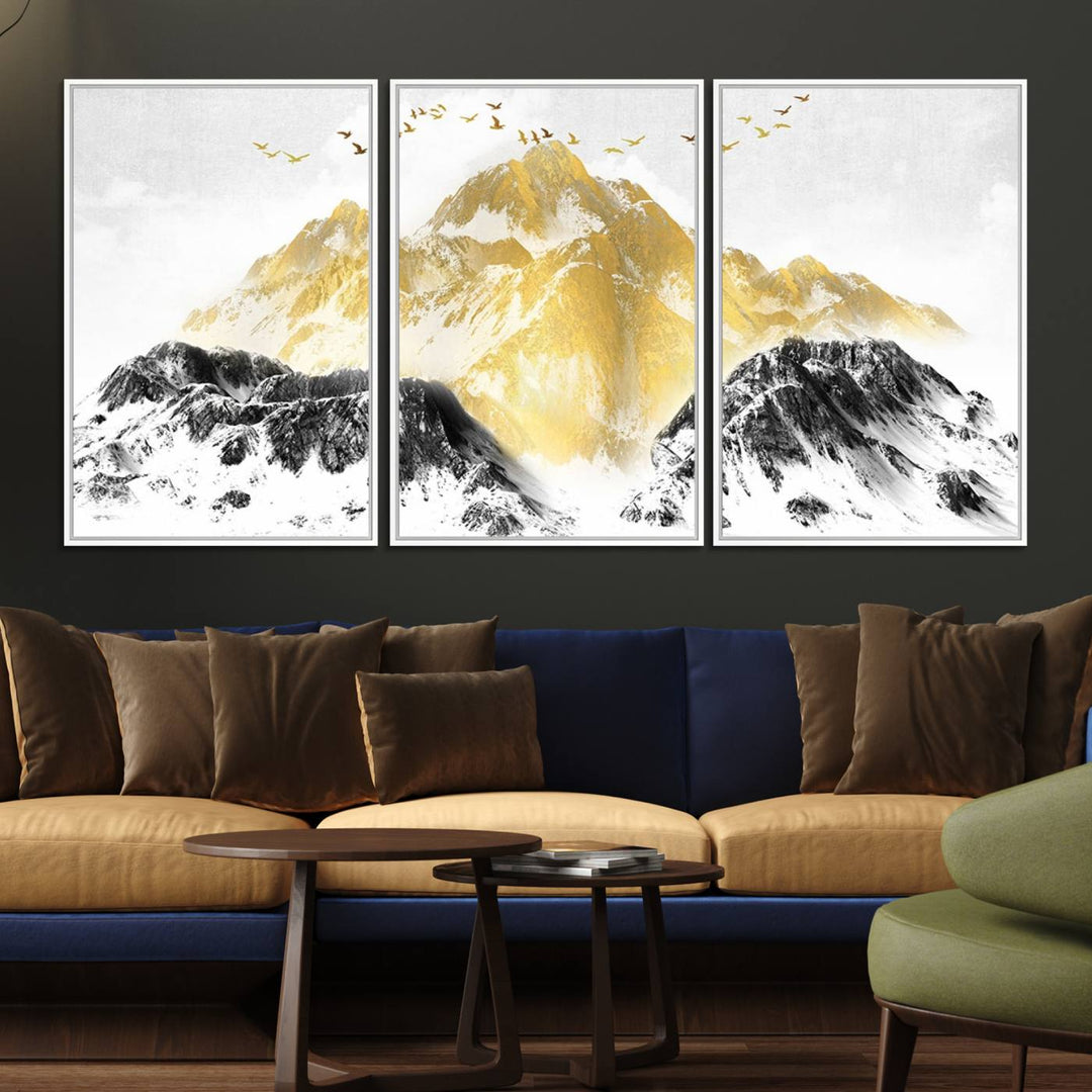 Golden Mountain Triptych Wall Art features gold-tinted mountains and birds.