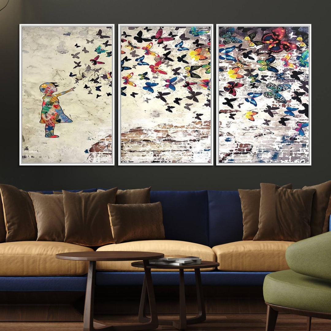 A Banksy Girl Butterfly Canvas Print is displayed on the textured wall.