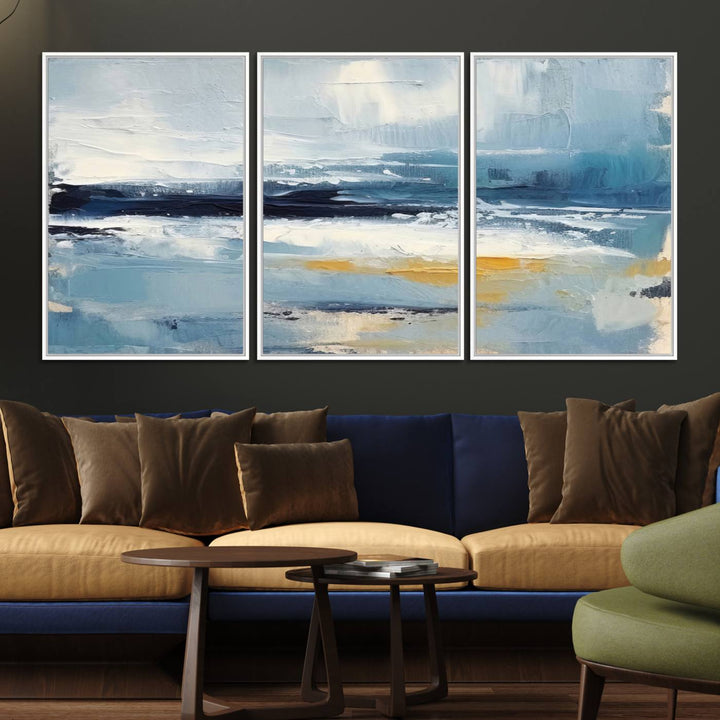 The Abstract Ocean Canvas Wall Art in coastal blue and gold enhances the modern kitchen.