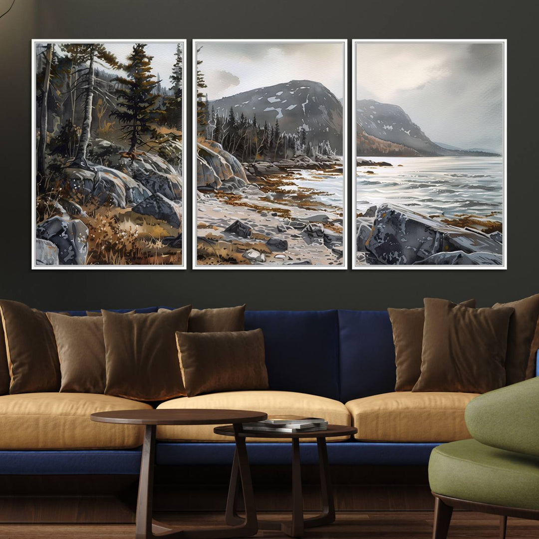 Framed wall art depicting Acadia National Parks rocky coast, trees, mountains, and sunlight over the sea; ready to hang.