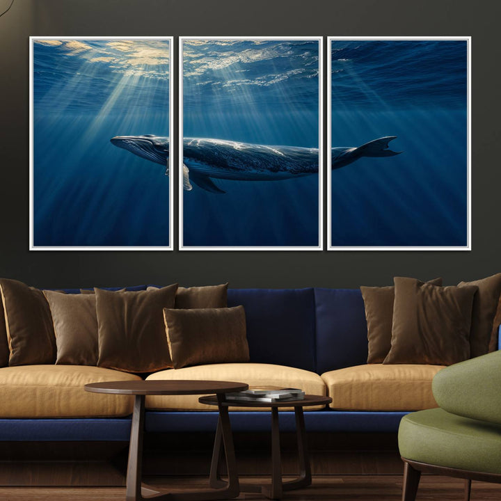 The Whale under Ocean wall art canvas print graces the white wall.