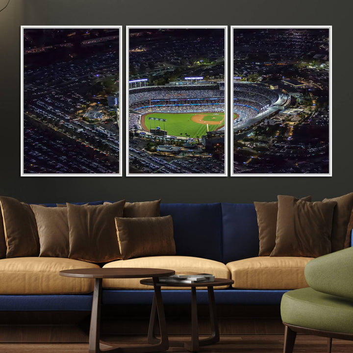 A large Los Angeles Dodgers print of Dodger Stadium at night is displayed near a window.