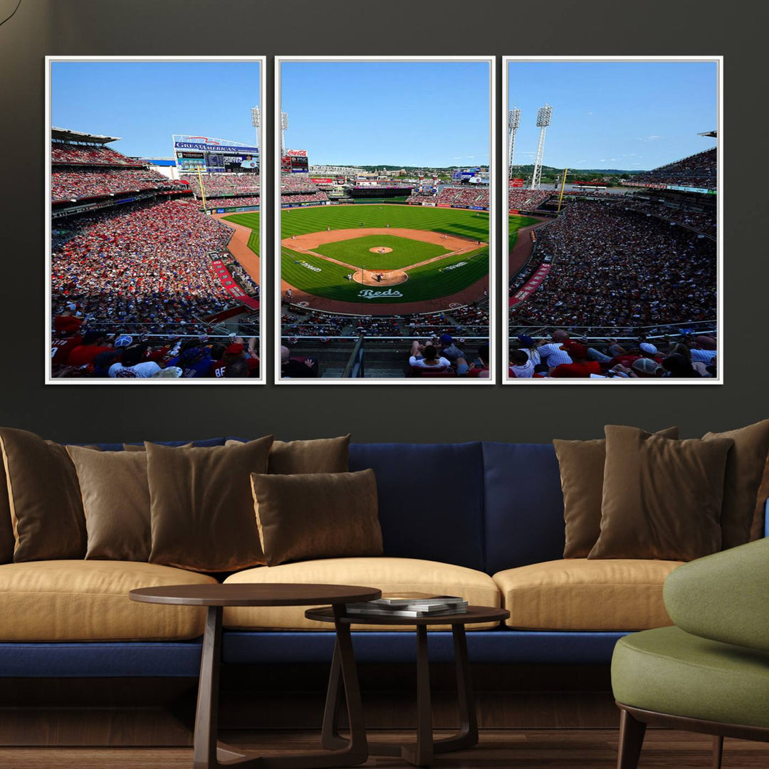 The Cincinnati Reds Baseball Team print of Great American Ball Park Stadium adorns the wall.