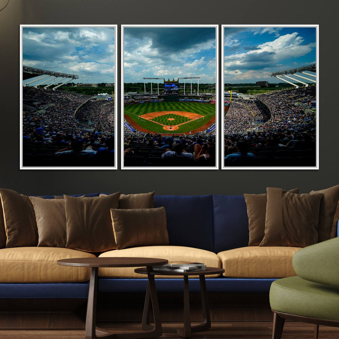 A 3-panel print of Kauffman Stadium, showcasing a crowded baseball field under cloudy skies.