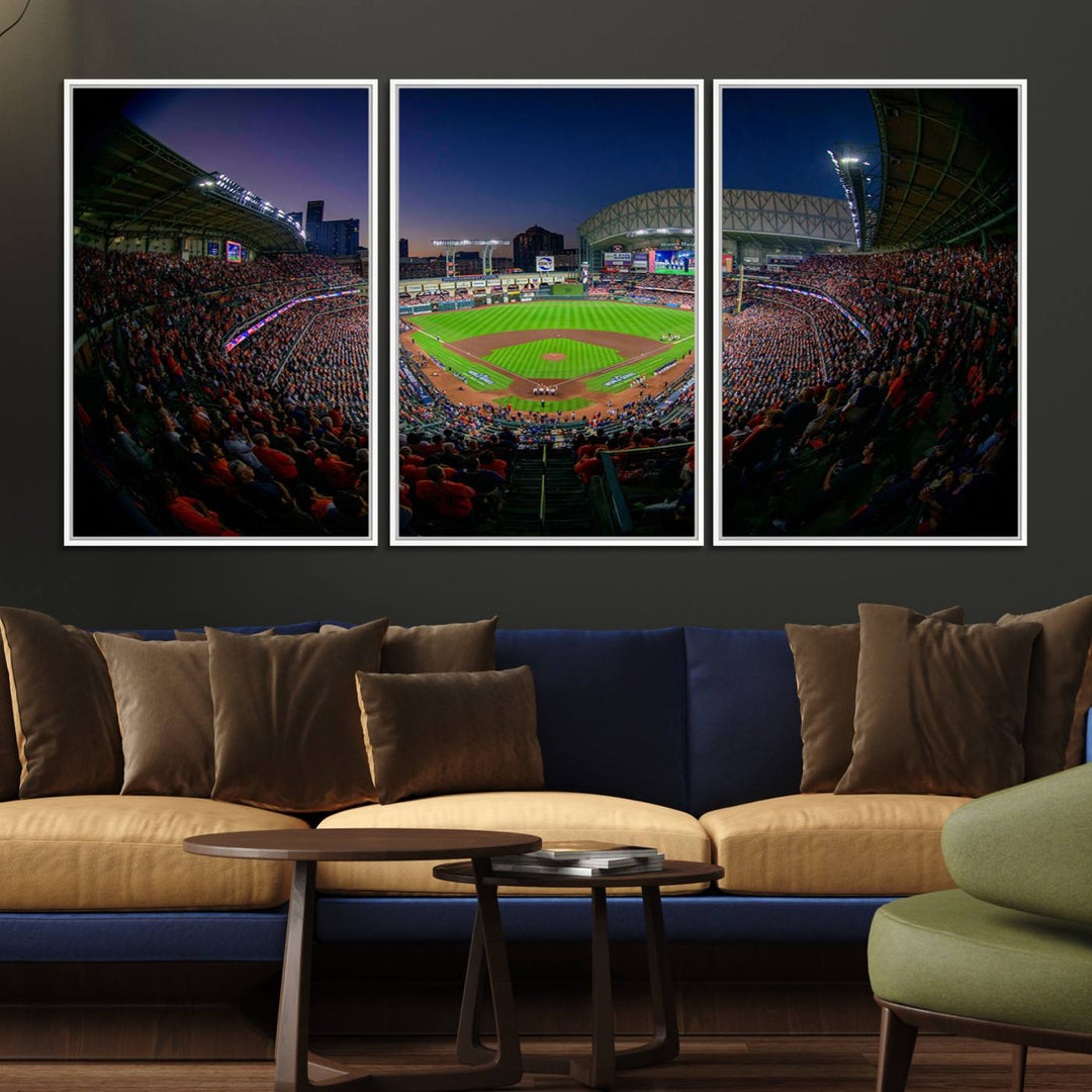 A canvas print of Houston Minute Maid Park at dusk is mounted on the wall.