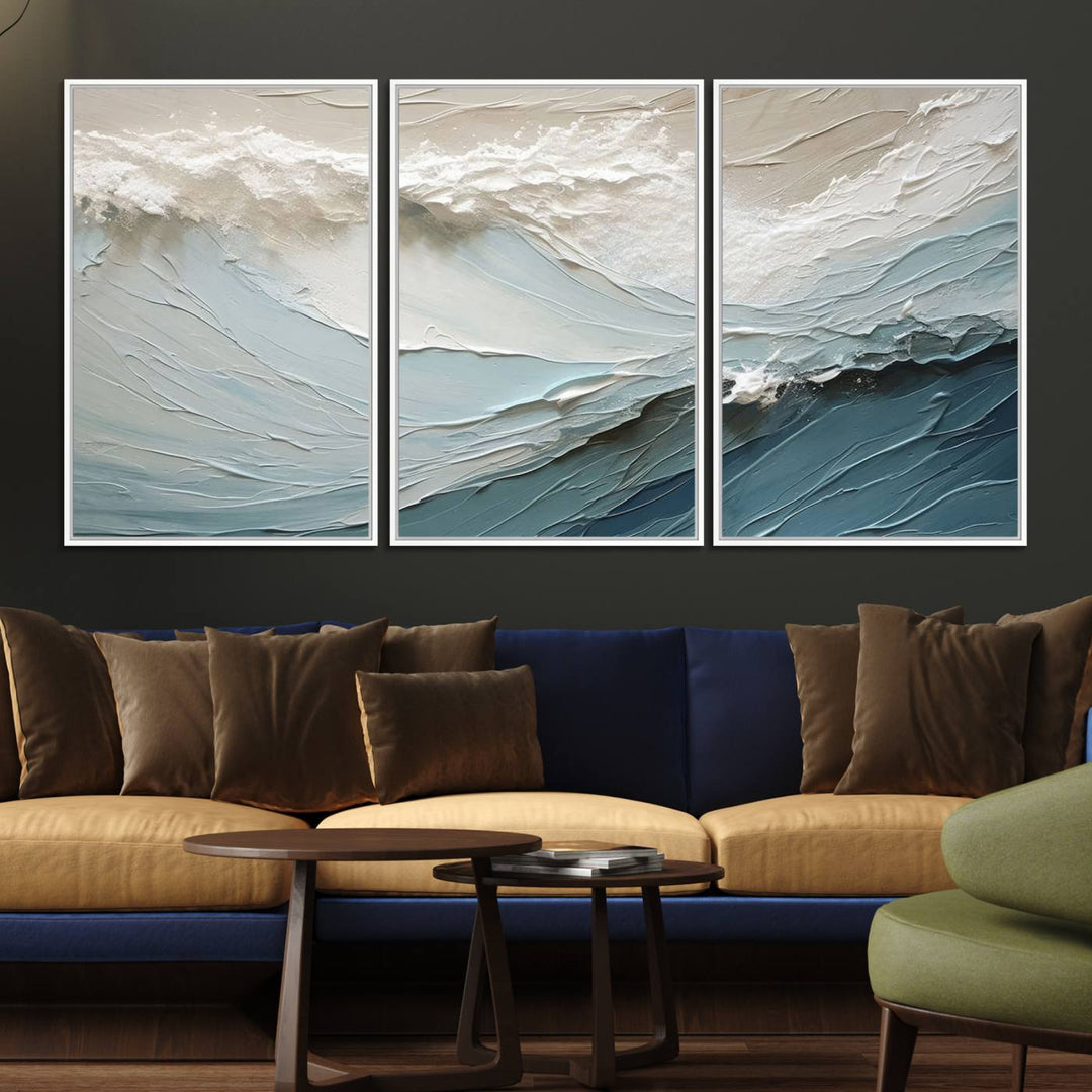 The Waves Abstract Wall Art Print is a large textured painting featuring ocean waves in beige and blue tones. This modern framed abstract canvas print captures the serene essence of seaside tranquility and serves as stunning ready-to-hang wall art, making it perfect as living room decor.