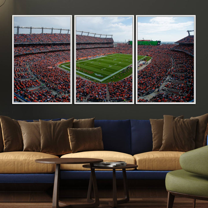 The Denver Broncos Football Print features a vibrant, fan-filled orange stadium overlooking the football field.