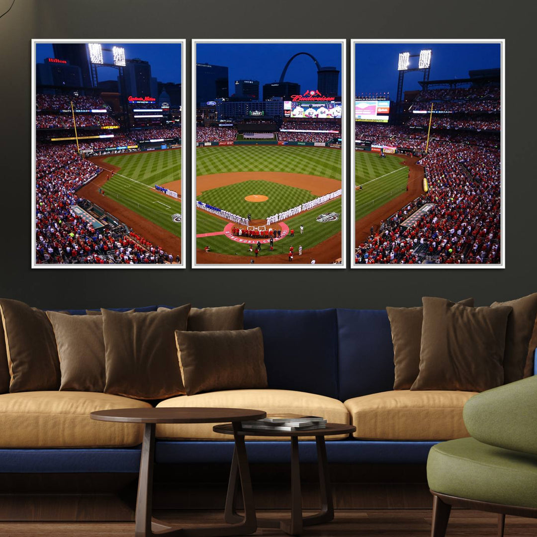 A Cardinals wall art canvas print depicts Busch Stadium with players lined up on the field and a full audience under the lights, capturing the vibrant atmosphere.