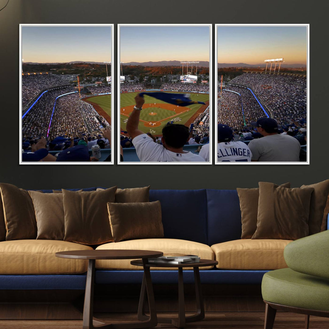 A triple canvas wall art captures the scene at Dodger Stadium, with fans cheering as the sun sets and a flag waving on the field.