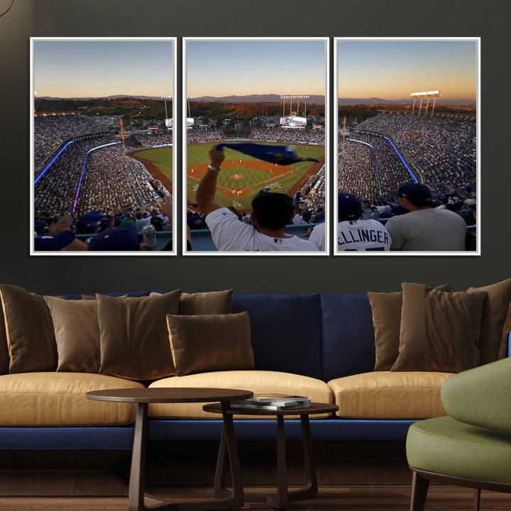 A triple canvas wall art captures the scene at Dodger Stadium, with fans cheering as the sun sets and a flag waving on the field.