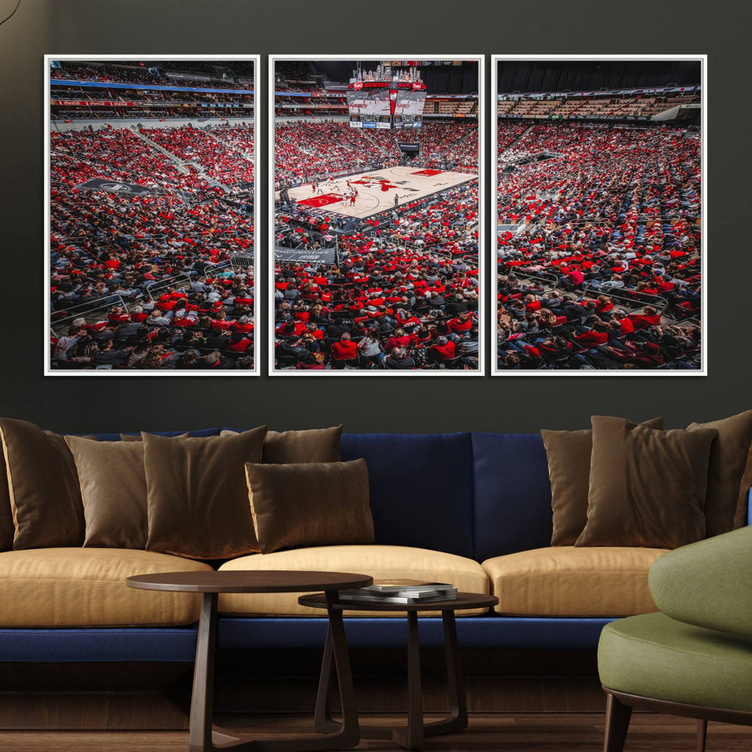 A painting of Louisville Cardinals fans in red at the KFC Yum Center Arena.