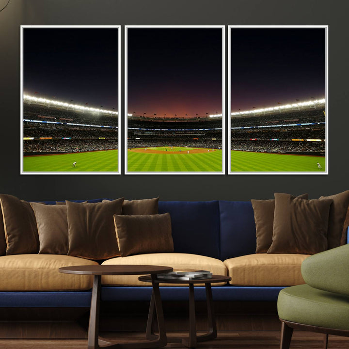 A night game at Yankee Stadium depicted on canvas beneath a sunset sky.