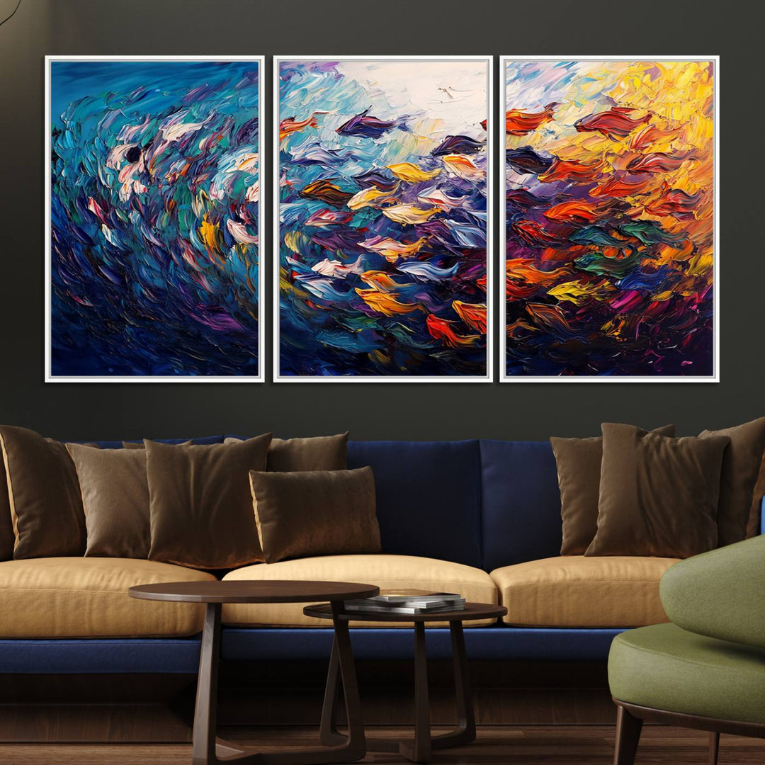 The Vibrant Abstract Fish Swarm Art features a colorful 3-piece canvas that adds a pop of color.