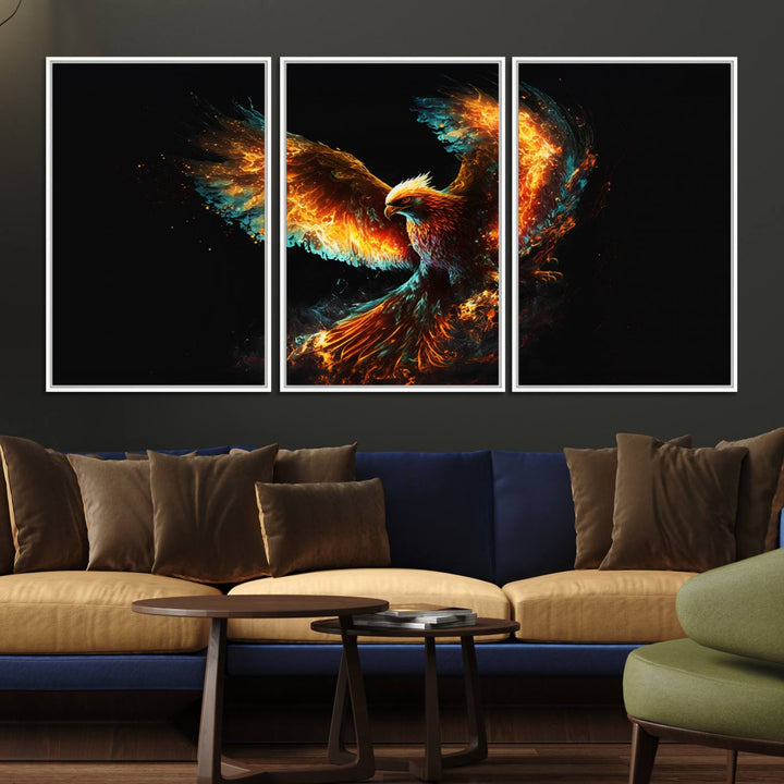 The Fiery Phoenix Canvas Print, showcasing a majestic bird with fiery wings against a black background, makes for the perfect bold decor in your living room.