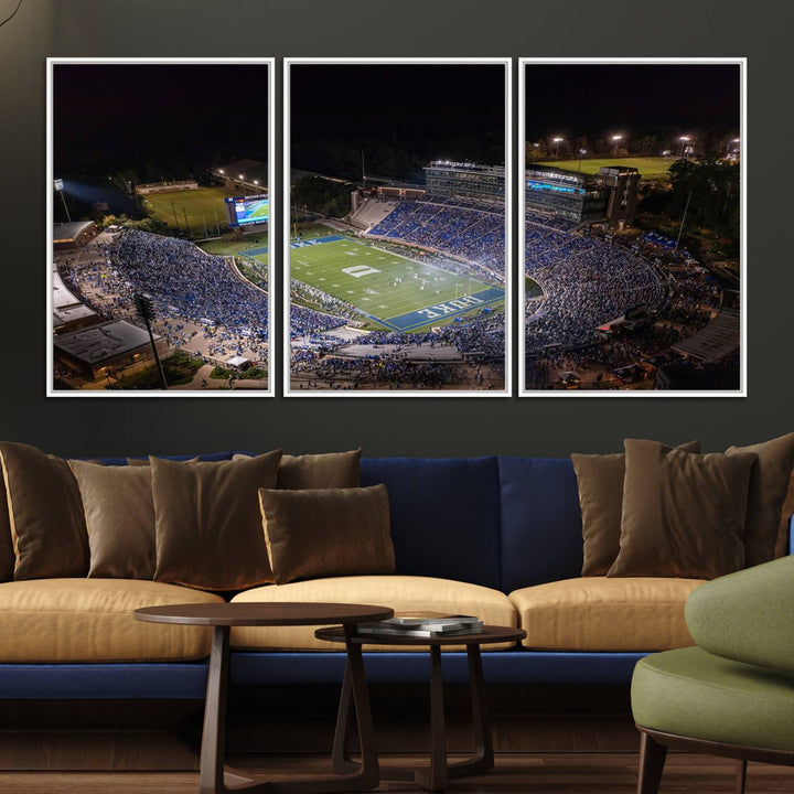 Night aerial view of packed Duke Blue Devils Wallace Wade Stadium, surrounded by trees and illuminated by lights; perfect for high-resolution prints.