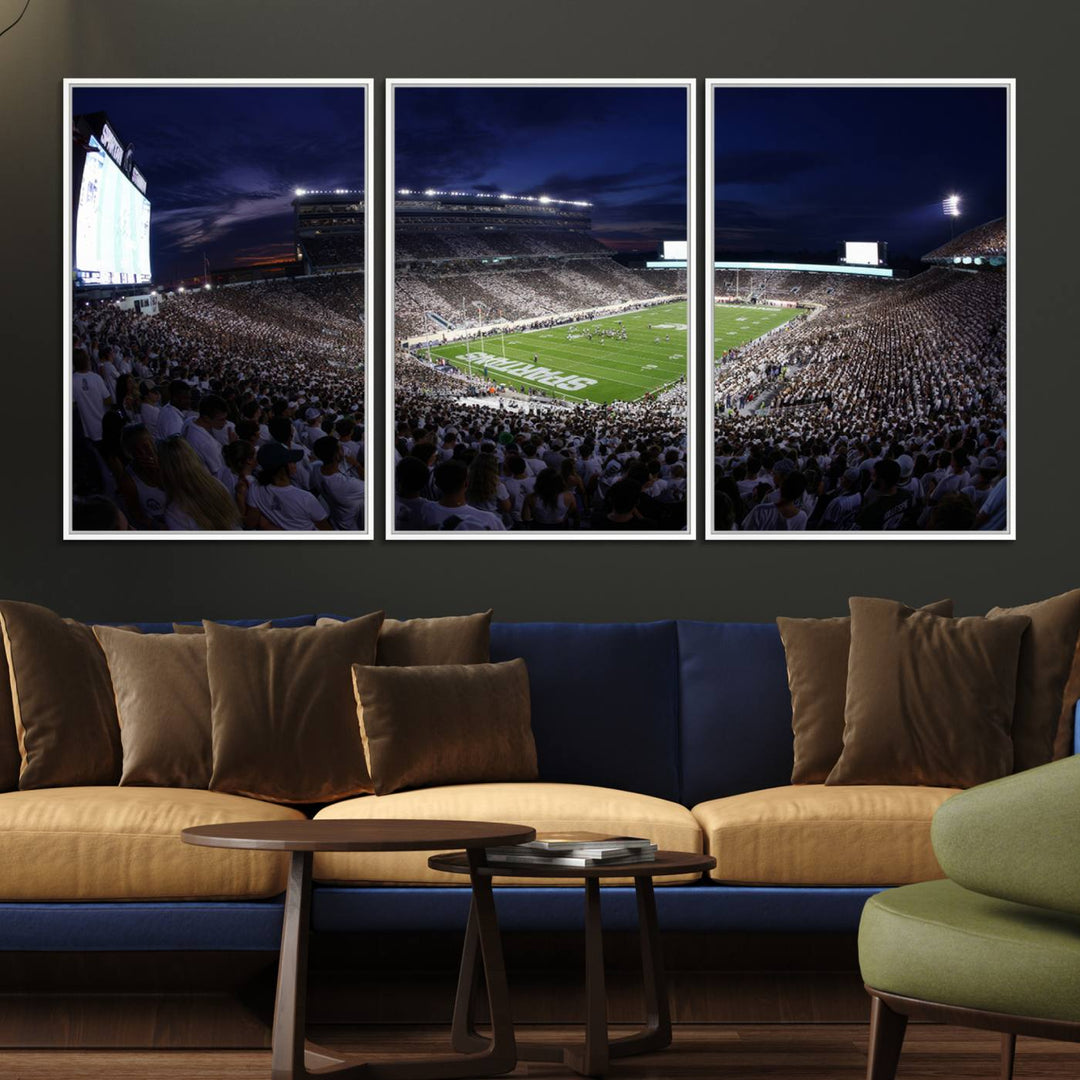 A packed football stadium at night, with bright lights and fans in white, depicted in a Michigan State Spartans Stadium wall art.