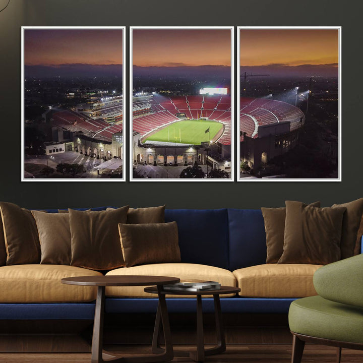 The USC Trojans Stadium canvas captures Memorial Coliseum at twilight, showcasing red seats and a green field beneath an orange sky.