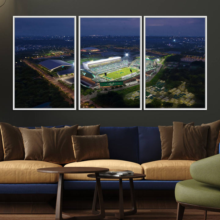 The USF Bulls Football Team Wall Art Canvas Print showcases the Tampa USF Football Stadium at night with city lights.