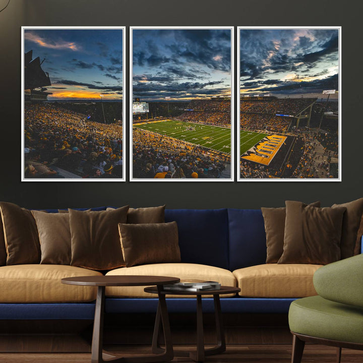 Laramies War Memorial Stadium Print captures a stunning scene of the stadium during sunset, set under a partly cloudy sky illuminated by bright lights.