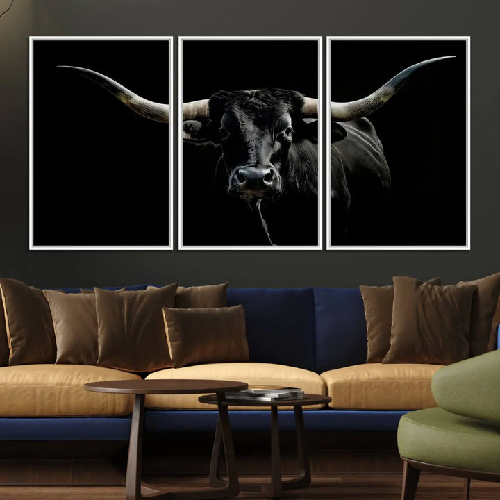 A captivating close-up canvas print of a Texas Black Longhorn with impressive curved horns set against a dark backdrop, ideal as a standout piece in your collection of Longhorn Cow Wall Art.