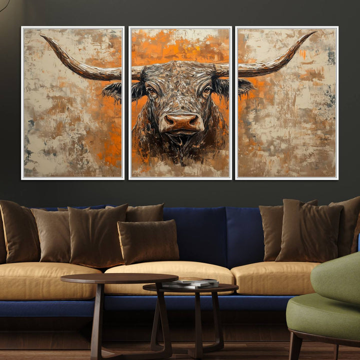 Abstract Cow Longhorn Bull Wall Art presents a detailed face centered on a textured orange and beige background.