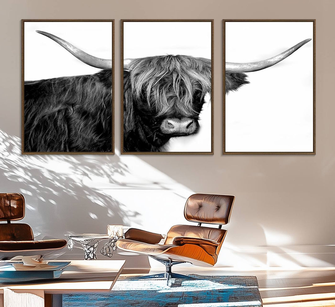 The Black and White Highland Cow Multi Panel Wall Art Canvas Print with UV-protection hangs prominently.