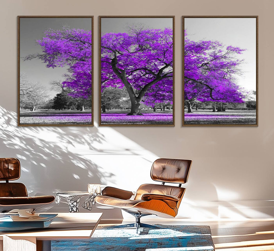 The Big Purple Tree Wall Art Canvas Print showcases a vibrant purple tree set against a black-and-white landscape.