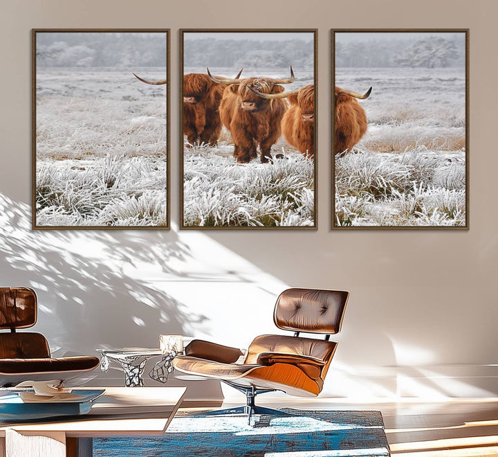 The Highland Cows in Snow canvas showcases three cattle in a frosty field.