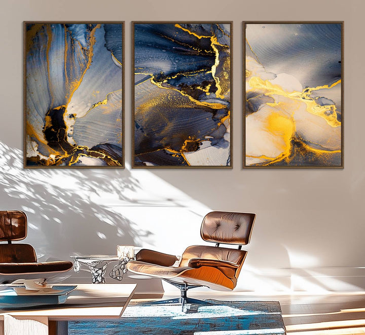 A modern luxury kitchen features a large gold and blue abstract canvas wall art print.