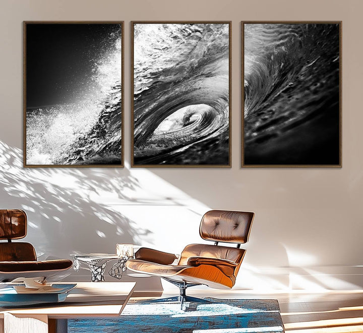 The Black Ocean Wave at Sunset Canvas Art hangs on a grey wooden wall.