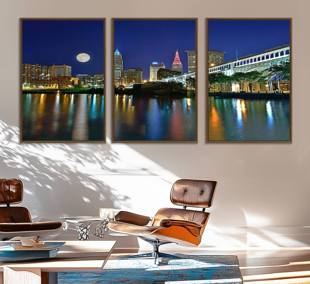 Cleveland City Lights Night Skyline Wall Art canvas showcases a moonlit cityscape reflected on water.