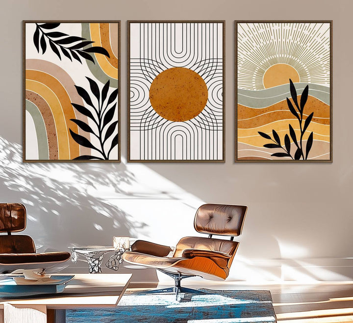 The Modern Boho Sun and Leaf giclée canvas is a 3-panel piece designed for mid-century or bohemian decor.