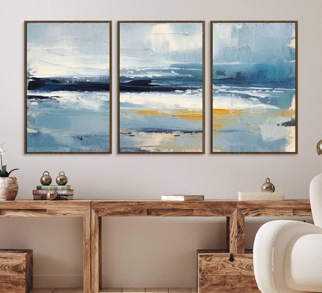 The Abstract Ocean Canvas Wall Art in coastal blue and gold enhances the modern kitchen.