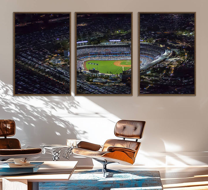 A large Los Angeles Dodgers print of Dodger Stadium at night is displayed near a window.